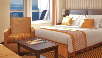 1648730555.4789_c150_Carnival Cruise Lines Carnival Conquest Accommodation Junior Suite.jpg